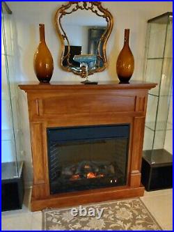 Charmglow Fireplace electric flames, heater, glass doors with wood mantel